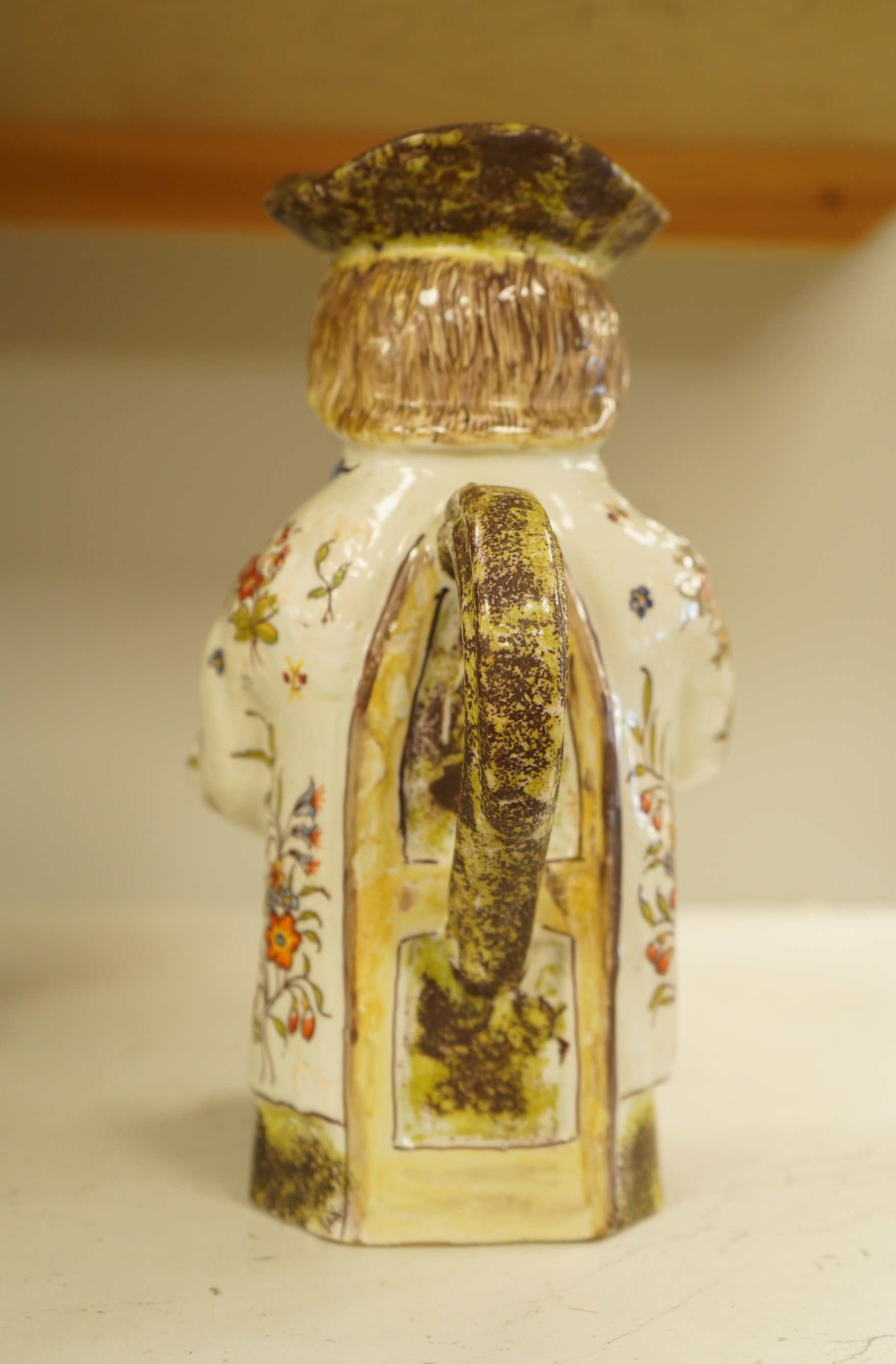 A French 'Rouen' Faience Toby Jug, 20th century, 25cm